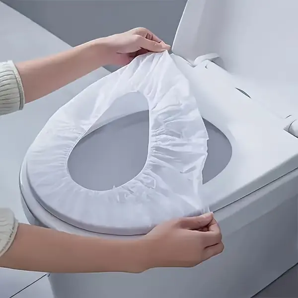 50 huuhtoutuvan WC-istuimen suojan pakkaus Kannettava matkapakkaus, pehmeä ja hygieeninen. Edullinen Hinta